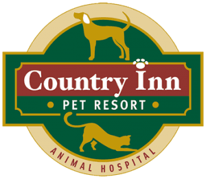 Country Inn Pet Resort and Animal Hospital logo. Logo is green gold and burgundy with a gold dog at the top and a gold cat at the bottom