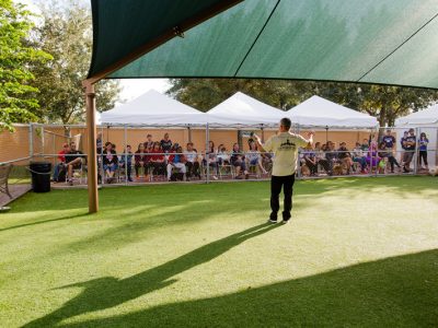 Cesar Milan the Dog Whisperer conducting a training session